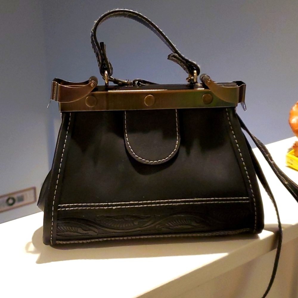 Unique DOVER purse with metal closure. Must see. Boutique find